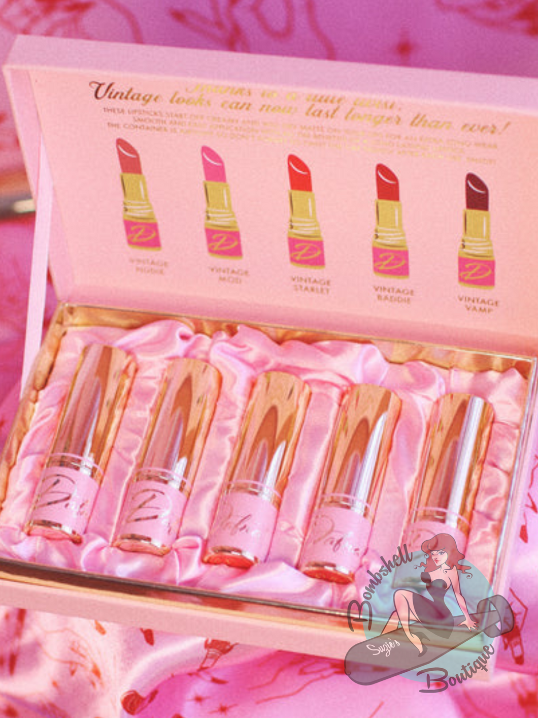 Full collection of Dafna Beauty matte lipsticks in pretty pink box with pink satin lining. Perfect for creating a vintage pin up make up look.