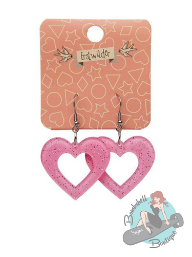 Heart shaped drop earrings in pink glitter.