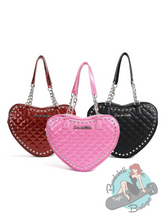 Heart shaped purses for Goth Pinup Altfashion. These handbags come in sparkle vinyl with metal studs in various colours.