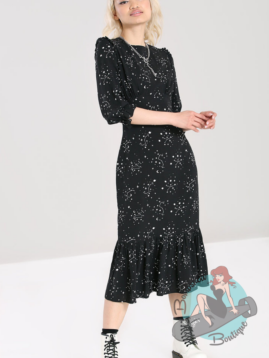Black midlength dress with silver zodiac constellation pattern. A 1940's inspired pin up dress.