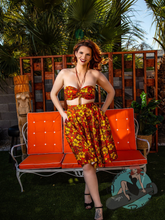 Orange and yellow crop top with drawstring tie. This top looks great with the orange and yellow tiki circle skirt for a pinup vintage look.