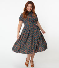 Unique Vintage Springfield retro vintage paisley pin-up pinup swing dressUnique Vintage Springfield Paisley Teal Swing Dress retro vintage pinup shirtdress housedress 50s dress in green with gold paisley Canadian Pin-Up Shop Suzie's Bombshell Boutique