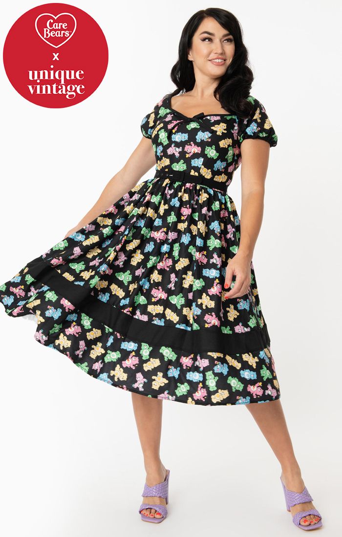 Unique Vintage Care Bears Hannah Playtime Swing Dress Unique Vintage Canada 80s novelty print of care bears in pink green yellow and blue on black background retro vintage pinup altfashion rockabilly 50s dress Canadian Pin-Up Shop Suzie's Bombshell Boutique