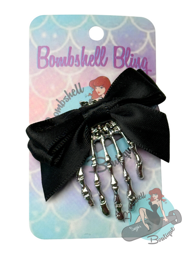 Bombshell Bling Skeleton Hand Bow Hair Clip