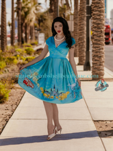 Boulevard Nights Custom New Orleans Border Print Dress Rockin Bettie Elle Rebel swing dress 40s 50s retro vintage pinup flared dress in turquoise with print of New Orleans on border of skirt Canadian Pin-Up Shop Suzie's Bombshell Boutique
