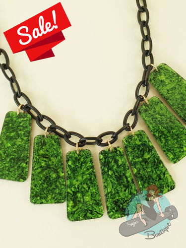 Handmade in England by Bow & Crossbones, 1940s Vintage-inspired statement necklace featuring textured green rectangular resin pendants suspended from a chunky black chain.