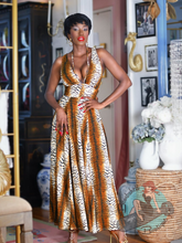 Pinup girl wearing Rebel Love tiger print maxi dress