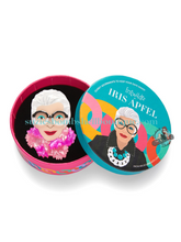 Erstwilder Canada Erstwilder x Iris Apfel Pretty in Pom Poms Iris Brooch lapel pin of Iris Apfel face with big black glasses and pink ruffles around her neck acrylic resin costume jewellery jewelry quirky altfashion pinup accessories Canadian Pin-Up Shop Suzie's Bombshell Boutique