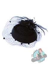 Vintage inspired 1950s style hat with small veil over face and feathers in back. Recreate old hollywood style with this hair accessory in black or red.