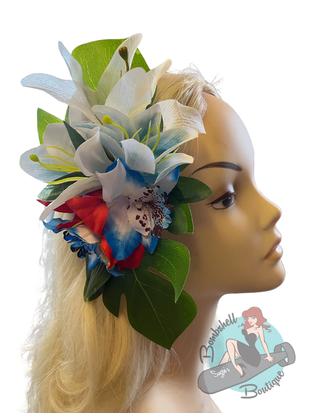 Rockabilly pinup hair flower clip. Perfect for completing a pinup hairstyle and tiki outfit. The flowers are tropical hibiscus in blue red and white set on a banana leaf and affixed to a hair clip.