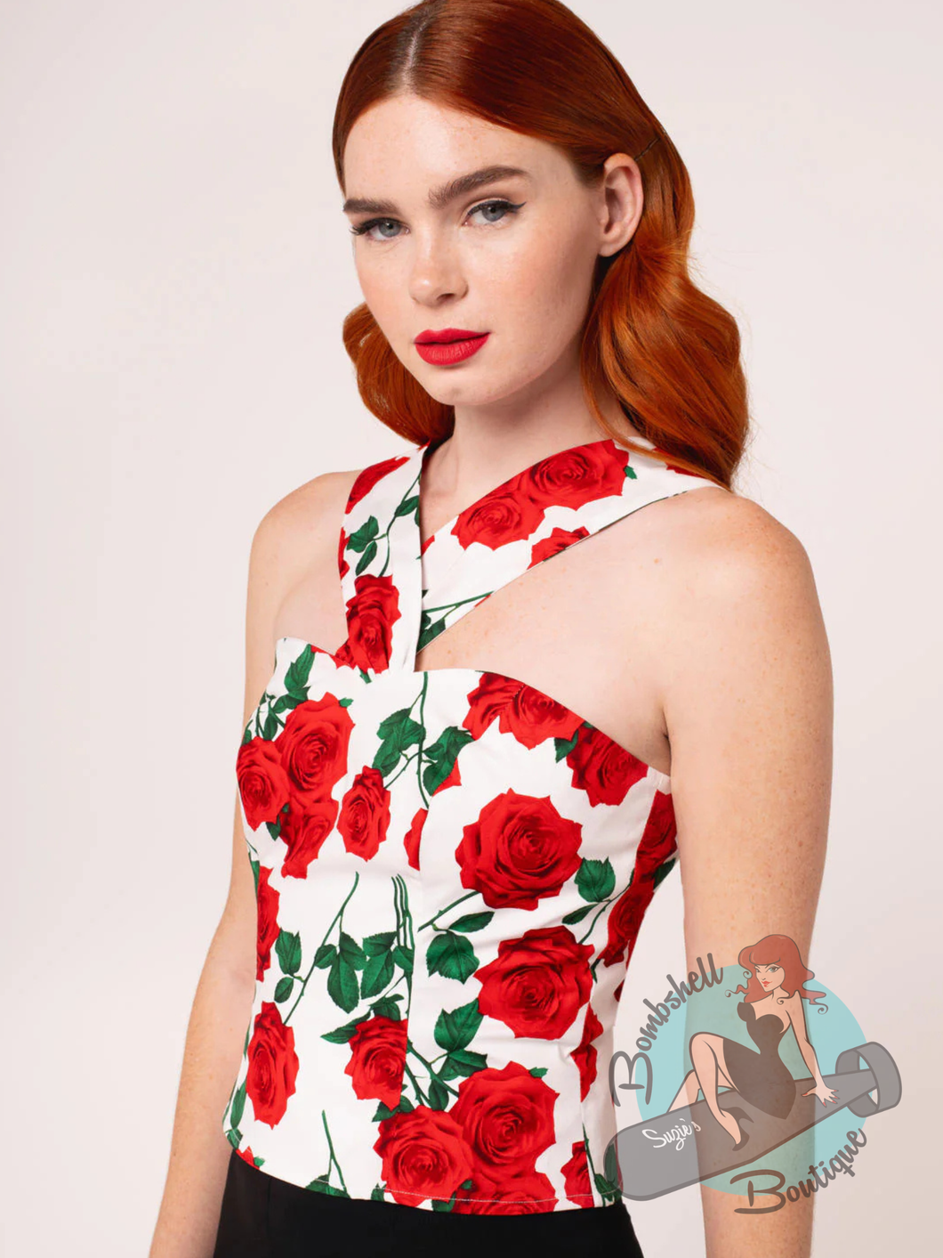 Pinup Woman wearing white cotton sleeveless blouse with red roses print
