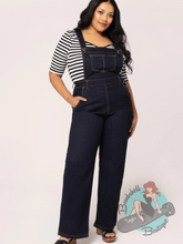 Plus size pinup girl in vintage denim