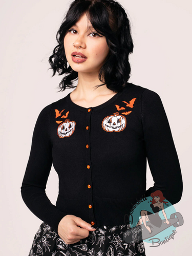 goth pinup girl wearing black knitted cardigan with halloween embroidery