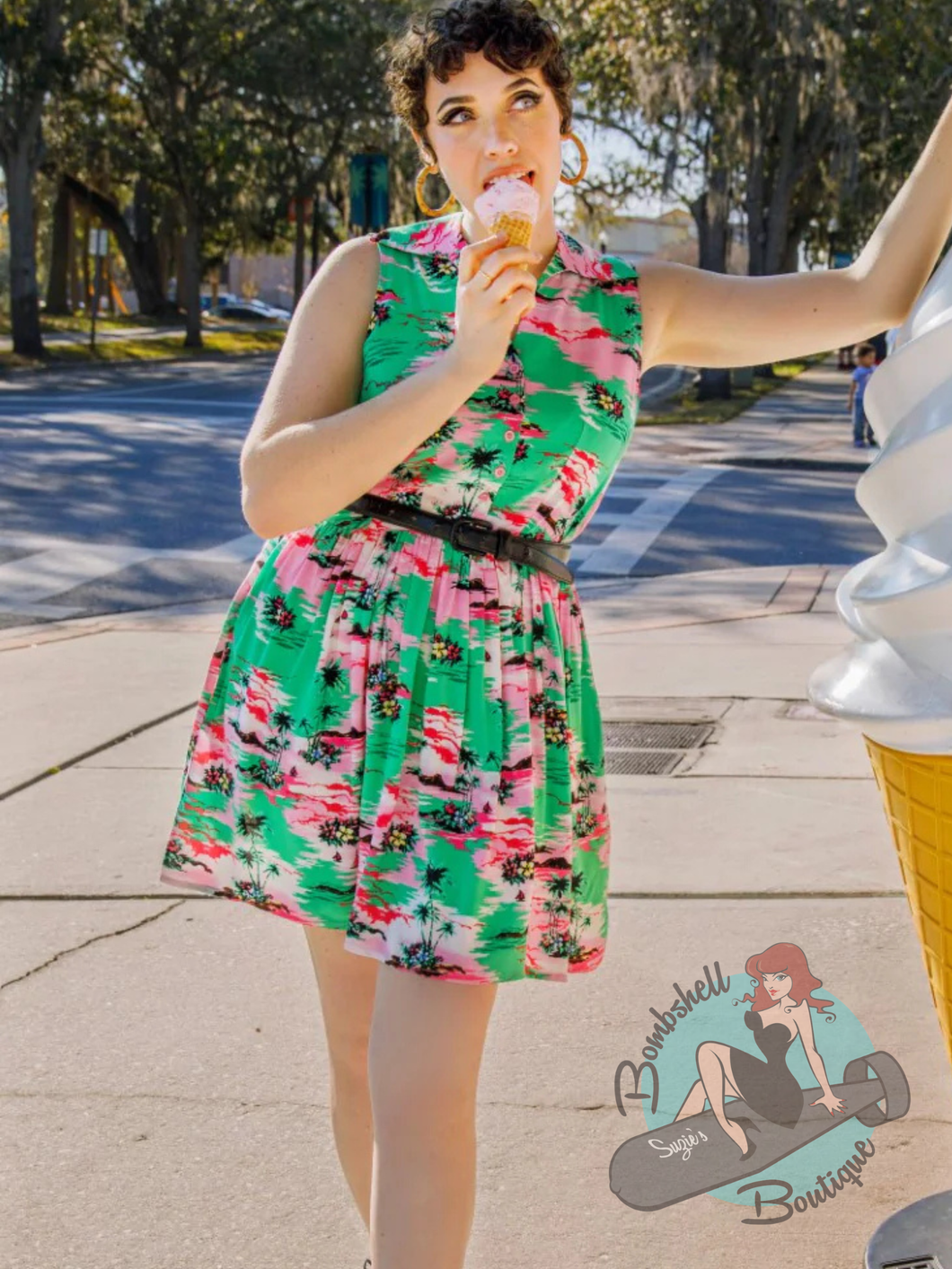 woman in vintage style tiki dress by hell bunny