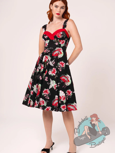 pinup girl wearing hell bunny canada black swing dress with japanese fan print