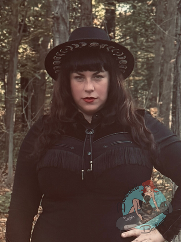 Southern gothic western pinup girl wearing black felt fedora style hat with moon images on it