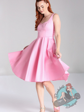 Pink cotton sateen swing dress with pockets. A 1950s style pin up dress.