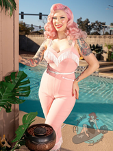 Pink Western jumpsuit in stretchy fabric perfect for pinup rockabilly event.