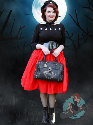 Pinup Girl carrying skull and stud bag
