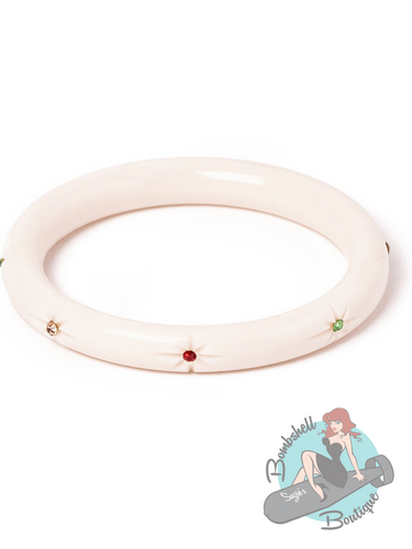 Thin white christmas bangle with starburst gem inlay of green, red, and gold. Perfectly accessorize your pin up holiday dress.
