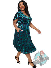 Plus size 1950s vintage style velvet pinup dress in teal.