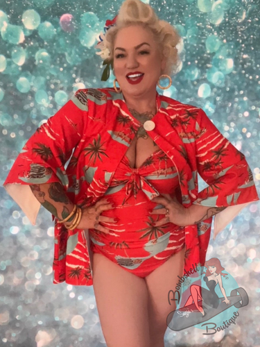 1950s style red tiki patterned beach jacket swim coverup lined with terrycloth for vintage pinup beachwear.