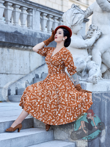 Woman in 1940s vintage style pinup dress
