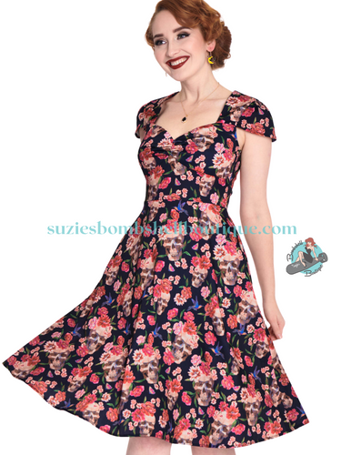 Voodoo Vixen Canada Voodoo Vixen Day of the Dead Flare Dress is a retro 1940s 1950s flared swing dress with skulls and roses gothic floral design with pockets altfashion rockabilly spooky pinup Canadian Pin-Up Shop Suzie's Bombshell Boutique
