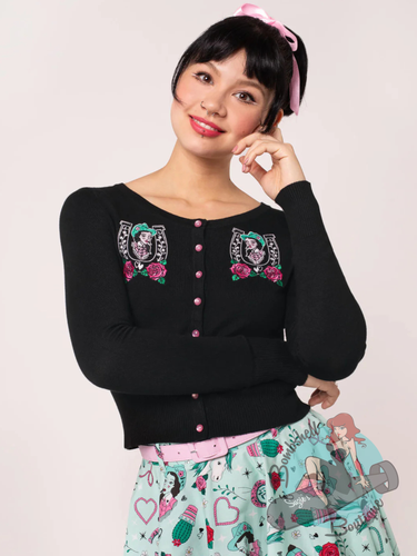 pinup girl wearing black cardigan with western queen of the rodeo embroidery