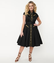 Unique Vintage Madeline Western Swing Dress in Black and Gold with fringe pearl snaps westernwear cowgirl country rockabilly retro vintage pinup sundress Suzie's Bombshell Boutique
