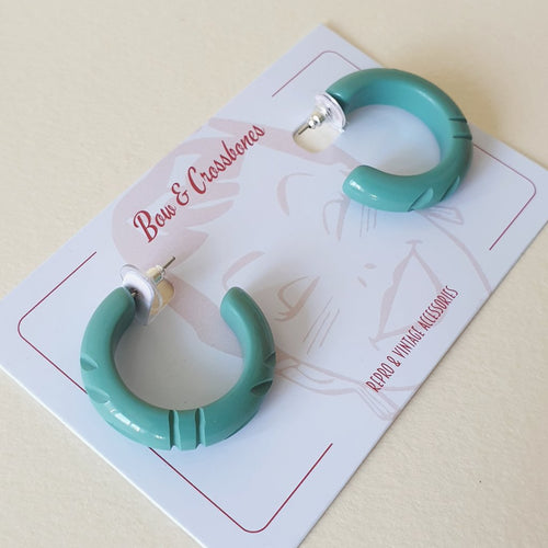 Bow & Crossbones Elsie Carved Hoop Earrings Seafoam Bow and Crossbones Canada green turquoise carved tiki earrings retro vintage pinup 40s 50s rockabilly acrylic jewellery Canadian Pin-Up Shop Suzie's Bombshell Boutique Port Dover